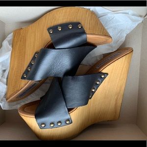 Black wooden clogs